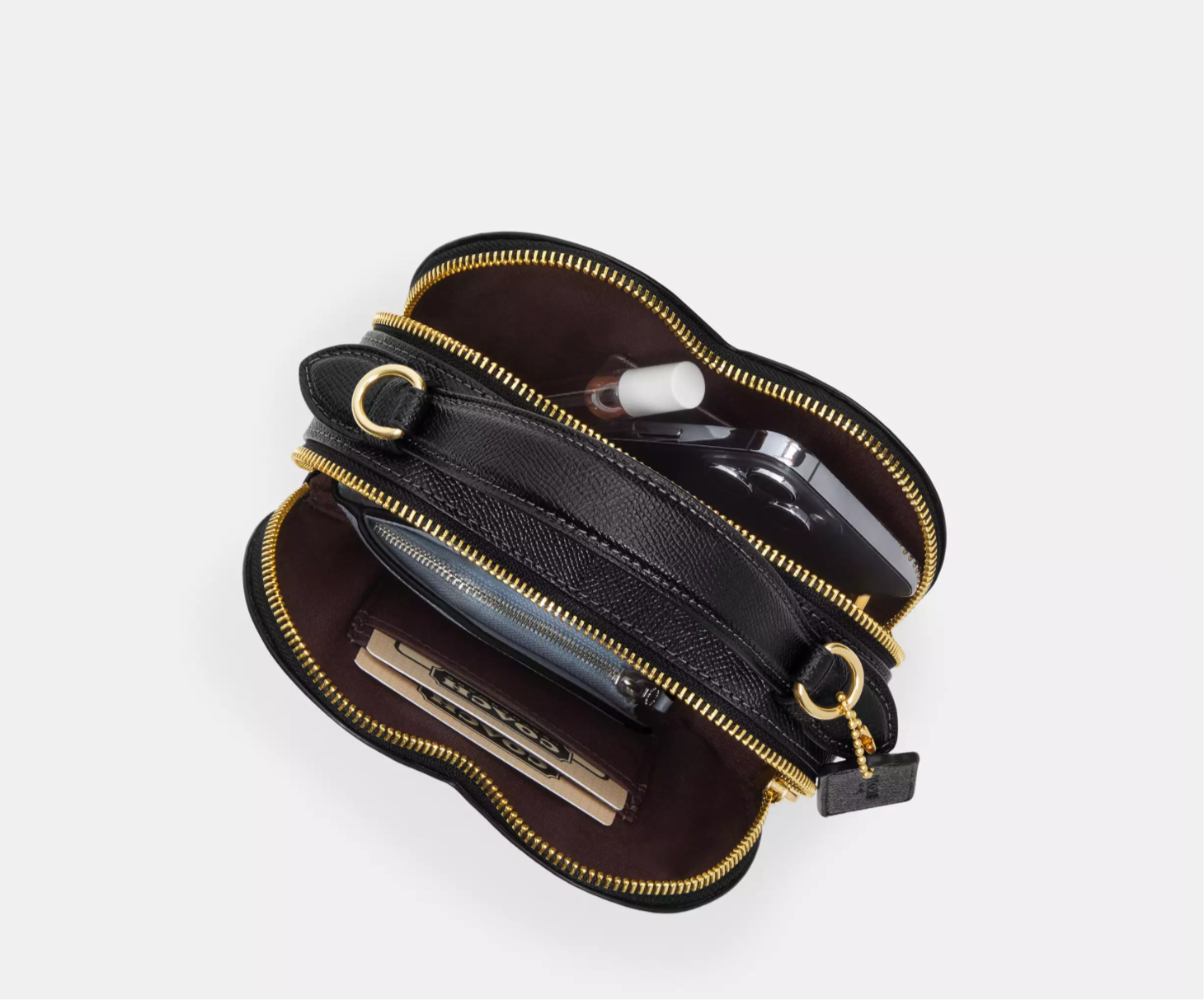 Coach Heart Crossbody Bag
With Bow Print